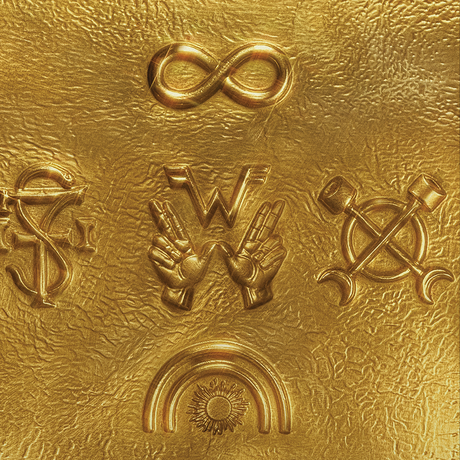 Golden textured vinyl record with embossed symbols and matching gold vinyl sleeve for weezer artifact wzr.004 black gold vinyl signed edition